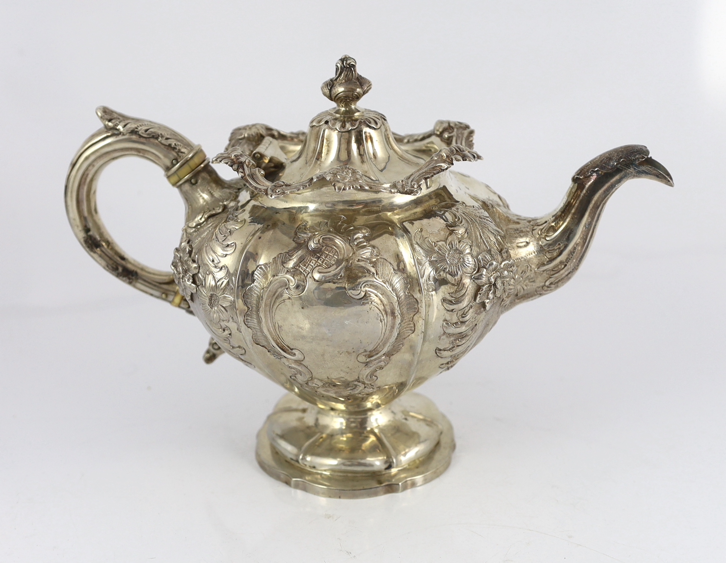 An early Victorian three piece Scottish silver inverted pear shaped tea set by Leonard Urquhart